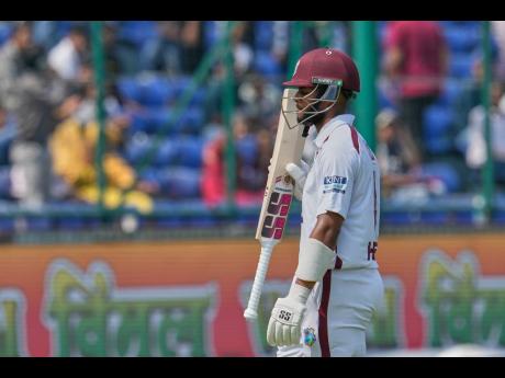 West Indies’ Shai Hope walks off the field after losing his wicket on the fourth day of the second Test match against West Indies at the Arun Jaitley Stadium in New Delhi, India, yesterday.