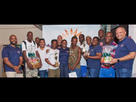  Members of the WIP Team with the first to third  place winners of the 2024 Canoe Tournament.