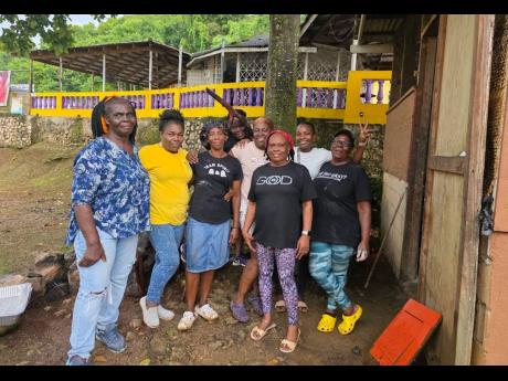 Family members (from left) Anita Watson, Naomi Barrett-Davis, Andrene Montague, Macrena Brandford, Marlene Bremmer, Lorna McDonald, Leslie-Ann Brandford and Cynthia Watson gather following a successful staging of the Cedar Valley Community Health Fair in 