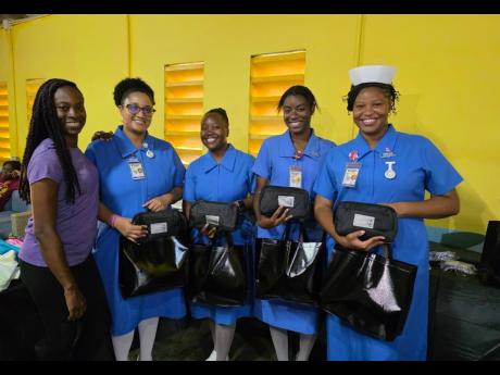 From left: Dr Juwell Harley, conceptualiser of the Cedar Valley Community Health Fair, along with student nurses Candice Walters, Patrice Taylor, Rashawna Morrison, and Abrianna Daley, who volunteered for the event.