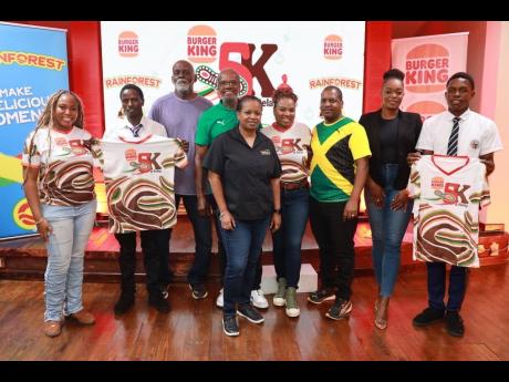 From left: Burger King Jamaica (BK) communication, community and strategy executive, Rashai Graham; Kingston College (KC) athlete, Stephen Mutili, KC middle-distance track coach, Hamlin Pagon; Running Events managing director, Alfred Francis, McCain Calati