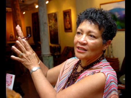 File Photos
Yvonne Brewster speaks with guests at the signing for her book ‘The Undertaker’s Daughter’ at the Bolivar Bookshop in St Andrew on January 8, 2005.