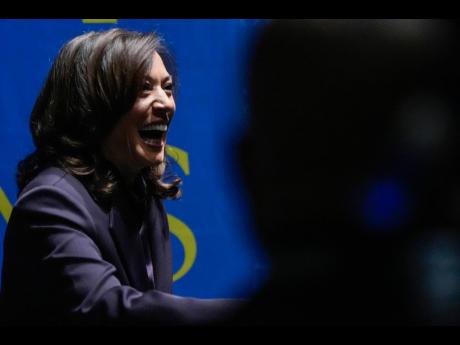Former United States Vice President Kamala Harris greets people before she speaks on October 17, 2025, in Birmingham, Alabama. 