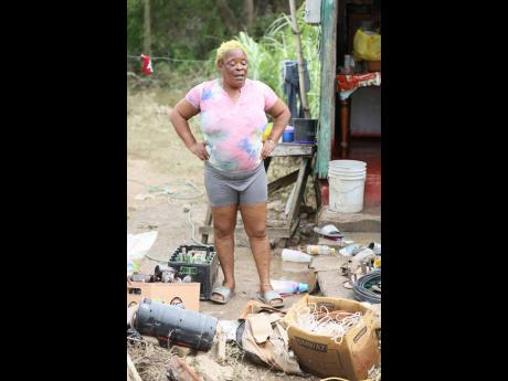 Denise 'Macka' Sinclair, of Bottom Halse Hall in Clarendon, says  Hurricane Melissa caused the sinkhole behind her house to rise to window level so she had to run out due of fear. 
