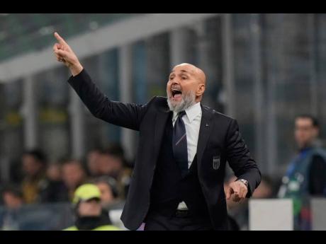 Italy’s head coach Luciano Spalletti gestures during the Nations League quarterfinal first leg match between Italy and Germany in Milan, Italy, on March 20, 2025. 