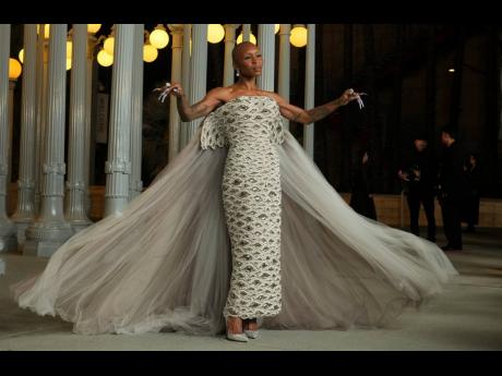 Credit: AP Cynthia Erivo shows off her Schiaparelli Couture look.