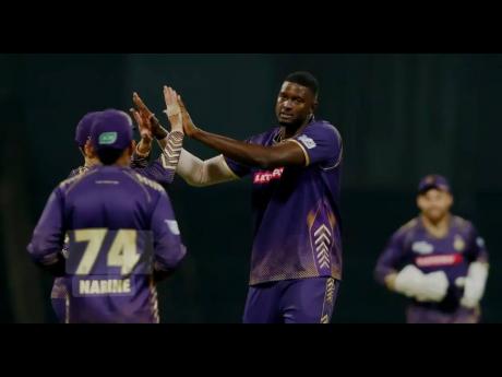 All-rounder Jason Holder (right) celebrates taking one of the 17 wickets he claimed for the Abu Dhabi Knight Riders during last season’s International League T20.