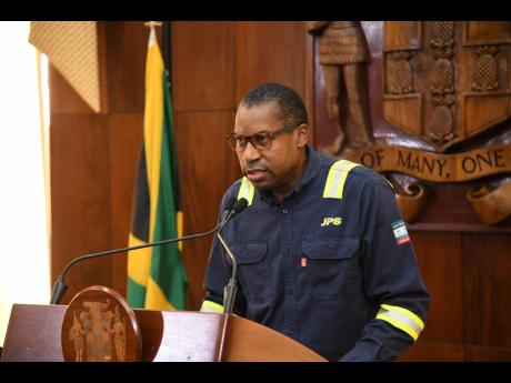 JPS President and CEO Hugh Grant addressing a special press briefing on Hurricane Melissa recovery on November 3, 2025 at Jamaica House.