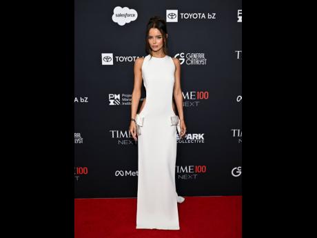 In true form, Maura Higgins captures the essence of Eli Mizrahi’s daring sensuality.