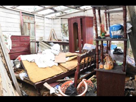Hurricane Melissa’s violent winds tore through Vincent Wilson’s mostly board-constructed home.