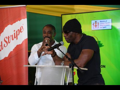 Christopher Martin (left) and Lukie D sing ‘Bridge Over Troubled Water’.