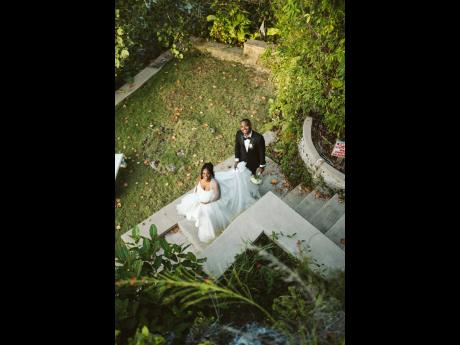 Credit: Jroyal Productions Just married and glowing, Kamille and Richard share a quiet moment between the cheers.