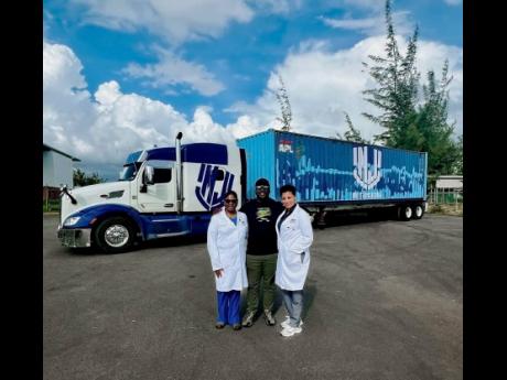 From left: Dr Dahlia Blake of Memorial Healthcare System; Captain Barrington Irving Jr, pilot and educator; and Dr Je‑Anne Beaufort of Memorial Healthcare System, after delivering more than 100,000 pounds of medical supplies to Jamaica in the wake of Hur