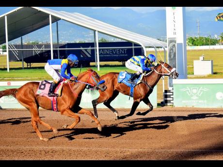 ANOTHER ONE (right), ridden by Shane Ellis, wins the Mother’s Day Special ahead of LOCKDOWN (Paul Francis) over five furlongs straight at Caymanas Park on Saturday, May 10.