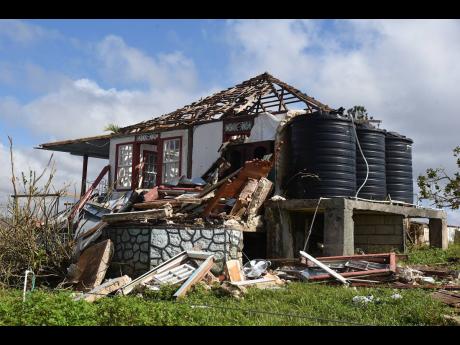 One of the many houses damaged during the passage of Hurricane Melissa.