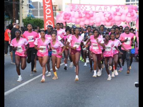 THEY ARE OFF: Participants at the start of Pink Run 2025 in New Kingston early yesterday morning.