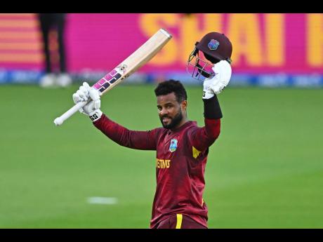 West Indies’ Shai Hope celebrates scoring a ceentury against New Zealand during their One-Day International cricket match in Napier, New Zealand, yeseterday.