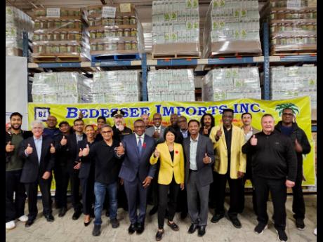 Thumbs up! Front row: Carlos Maharaj, treasurer of United Trinbago West Indian Association (UNI-TnT), Councillor Michael Thompson, Mayor Olivia Chow, and Councillor Neethan Shan with representatives of the Jamaican Canadian Association, Consulate General o