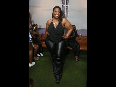 Credit: Nathaniel Stewart The curvaceous ‘Big Singa’ Courtni delivers a bold look in a plunging slouch halter and curve-hugging pants.