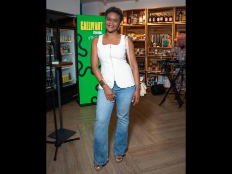 Credit: Contributed Natalie Fagan, head of talent acquisition and employee experience at the GraceKennedy Group, pairs a Zara vest and classic Old Navy denim with her Polène bag.