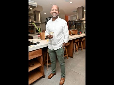 Credit: Rudolph Brown Always supportive of his life partner, Dylan Coke, husband of Janelle Pantry-Coke, made the rounds, engaging guests with ease.