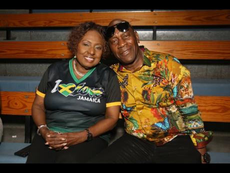 Pausing their confab for a quick photo are Olivia ‘Babsy’ Grange, minister of culture, gender, entertainment and sport, and reggae singer George Nooks.