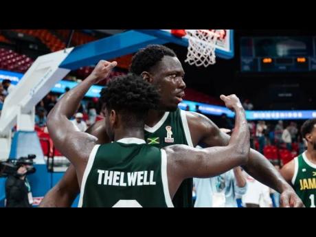Courtesy of www.fiba.basketball/en 
Jamaica’s Andrew Thelwell congratulates Kofi Cockburn after the centre converted a rebound to upset the hosts Puerto Rico in their FIBA World Cup Group B qualification opener 92-90 inside the Coliseo Roberto Clemente i