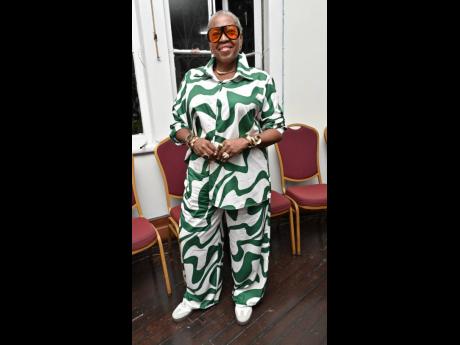 Credit: Rudolph Brown Shelly-Ann Daley scores points for her crisp green-and-white coordinated set.