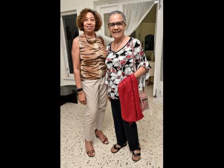 Credit: Rudolph Brown Fae Ellington (right), Jamaican media personality, shares a moment with Diane Edwards, director of the Professional Services Unit, Mona School of Business and Management.