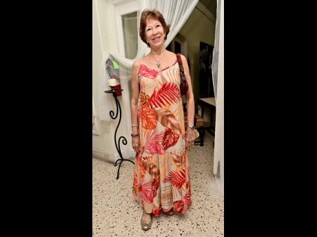 Credit: Rudolph Brown Sonita Morin Burrowes, owner of Afya Yoga & Pilates Studio, chose a flowy maxi for the occasion.