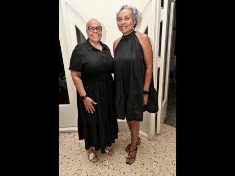 Credit: Rudolph Brown Nadine Sinclair, international transformational coach and owner of GO BOLD Coaching, and Dawnette Craig, attorney-at-law, know that black is always a winning choice.