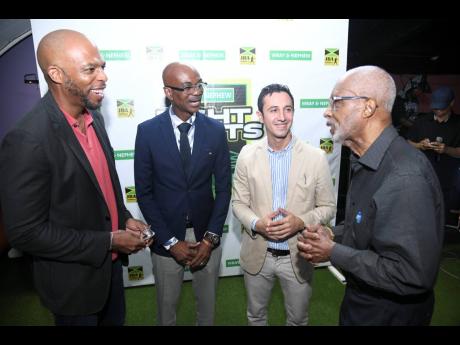 
From left: Stephen ‘Bomber’ Jones, president, Jamaica Boxing Board; Dr Howard Harvey, board member, Kingston YMCA;  Felipe Sanchez, national coach; and Leroy Brown, general secretary, Jamaica Boxing Board, engage in conversation at a media briefing on