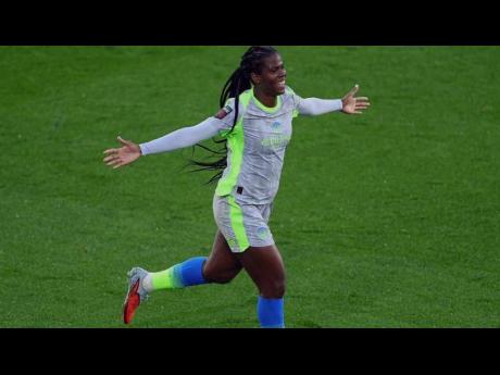 Khadija Shaw celebrates after scoring against Leicester City in the Women’s Super League.