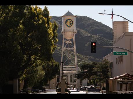 The Warner Bros. water tower is seen at Warner Bros. Studios in Burbank, California, Friday, December 5, 2025. (AP Photo/Jae C. Hong)