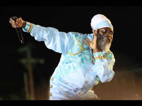 Credit: Nathaniel Stewart Capleton, the ‘Fireman’, checks the energy in the venue as fans respond in full force to his performance.