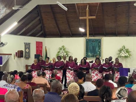 Members of the Portmore Chorale performing during their Christmas 2025 concert at the Church of the Holy Spirit.