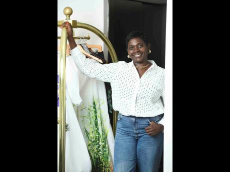 Ahead of the ‘Living’ photo shoot to spotlight her capsule collection, on which she collaborated with visual artist Tobean Walters, fashion designer Angella Wilkinson flashed her pearly whites.