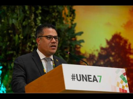 Jamaica’s Minister of Water, Environment, and Climate Change, Matthew Samuda, addresses delegates at the United Nations Environment Assembly in Nairobi, Kenya, on December 12, following his election as president. 