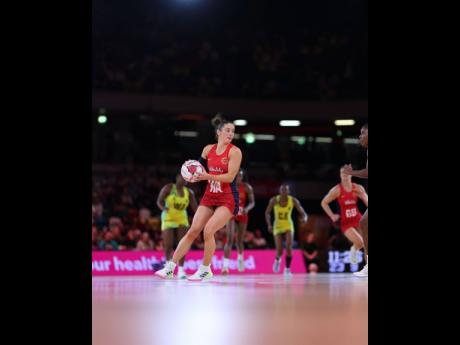 Action between Jamaica’s Sunshine Girls and England’s Roses in the Horizon Vitality Netball series inside the Copper Box Arena yesterday.