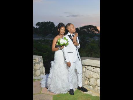 Holding each other close, the newly-weds look ahead to a new chapter of their lives.