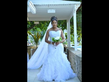 Carsia said yes to an off-the-shoulder mermaid dress by Bridal Gowns by Neita.
