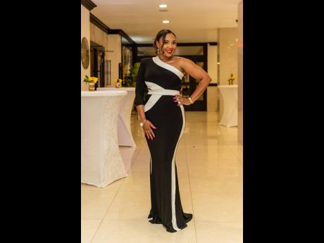 All eyes are on Kerry-Ann Heavens McGill, GraceKennedy Financial Group’s chief legal counsel and corporate secretary.