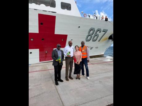 Wang Youli, Counsellor at the Embassy of the People’s Republic of China in Jamaica (second right), is pictured with Junior Gager, Mayor of Falmouth (left); Michael Belnavis, Mayor of St. Ann’s Bay (second left); and Garth Letts, Operations Manager at J