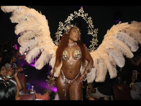 Tashnie Hinds wears Venus, designed by Anna-Lisa Guthrie.