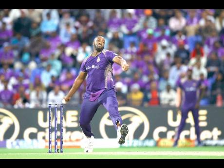 Abu Dhabi Knight Riders’ Andre Russell bowls during the DP World International League T20 game against the Desert Vipers at the Zayed Cricket Stadium in Abu Dhabi, United Emirates, yesterday. 
