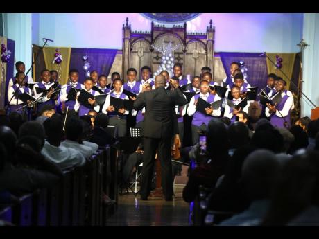 The Kingston College Chapel Choir in action at the St Augustine Chapel on the school’s North Street campus on Sunday.