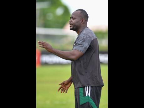 Credit: Matthew McKoy McGrath High School's head coach Jermaine Thomas.