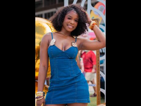 Denim is always in and business analyst D’Andra Clarke shows out in the perfect mini for a daytime party. 