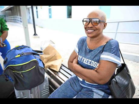 Credit: Ricardo Makyn/Chief Photo Editor Donnett Green, a cosmetologist travelling from the Turks and Caicos Islands, said she makes the journey home every year because family remains her top priority.