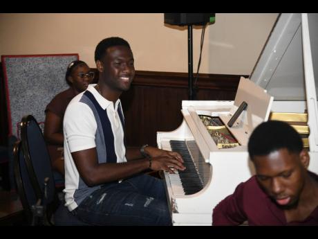 Evad Campbell on piano. 
